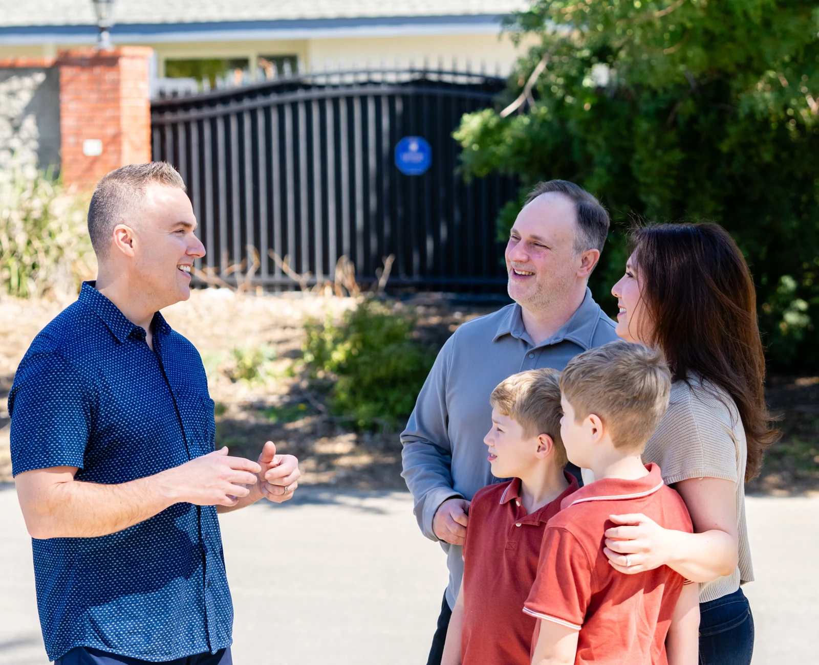 Tim talking with a local family