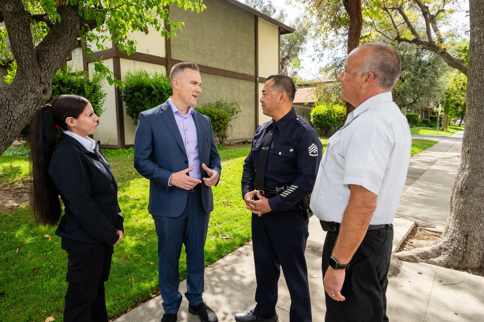 Tim talking with members of the West Valley community