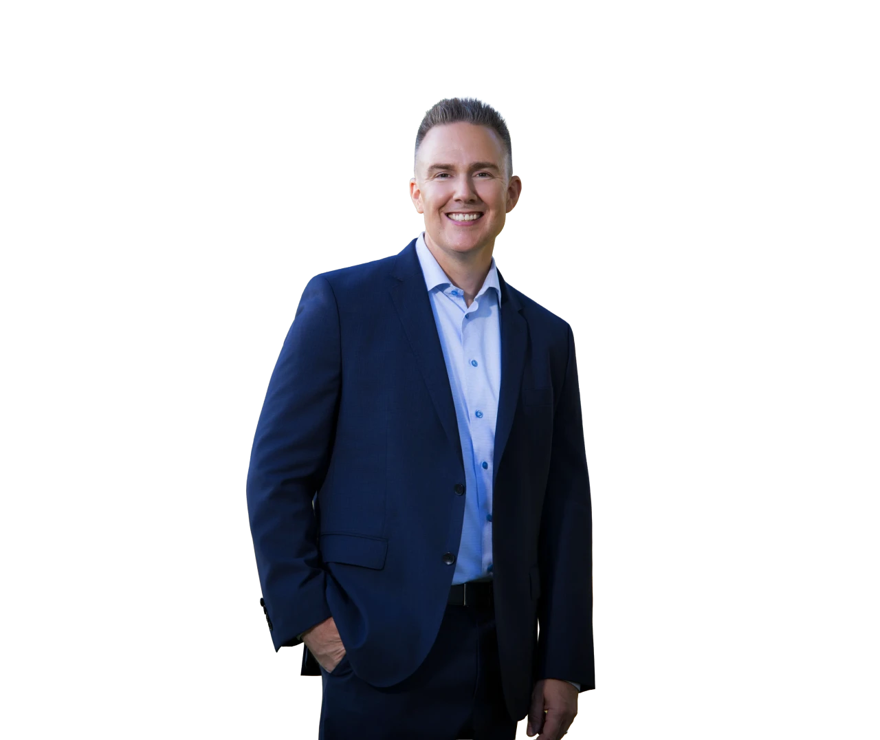 Tim Gaspar smiling in a navy suit